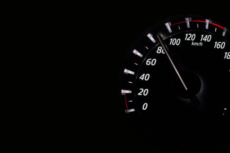 Speedometer reading showing speed in km/h on a dark background.